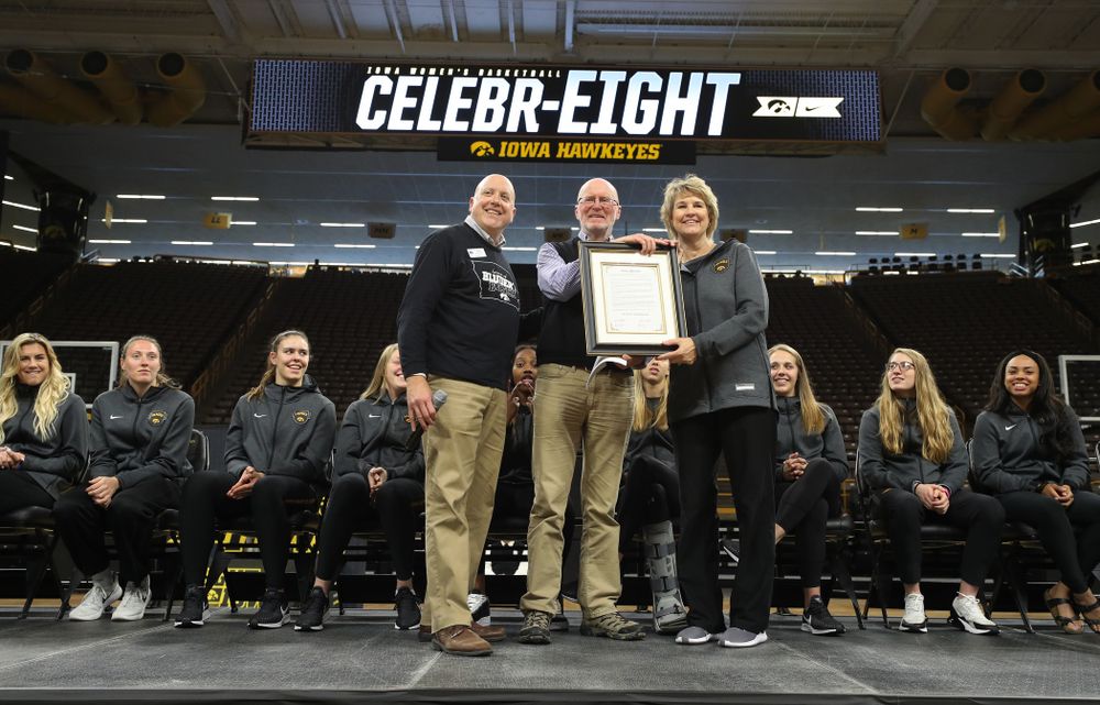 Iowa City Mayor Jim Throgmorton and Coralville Mayor John Lundell present Iowa Hawkeyes head coach Lisa Bluder with a joint proclamation designating April 24, 2019 as Iowa WomenÕs Basketball Day during the teamÕs Celebr-Eight event Wednesday, April 24, 2019 at Carver-Hawkeye Arena. (Brian Ray/hawkeyesports.com)