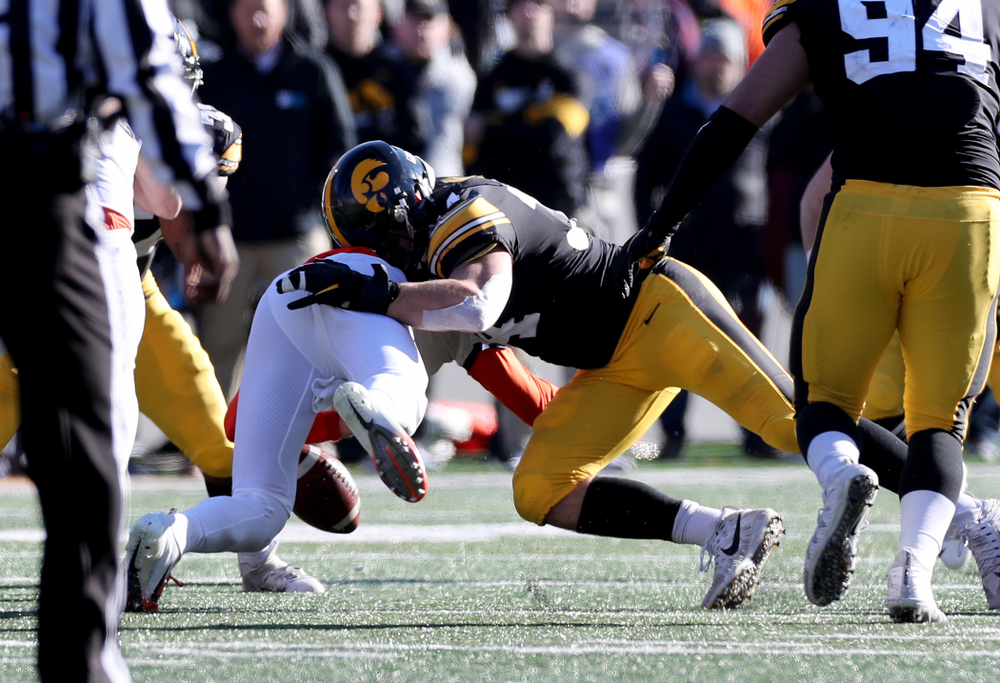 Iowa Hawkeyes linebacker Kristian Welch (34) causes a fumble against the Illinois Fighting Illini Saturday, November 23, 2019 at Kinnick Stadium. (Brian Ray/hawkeyesports.com)