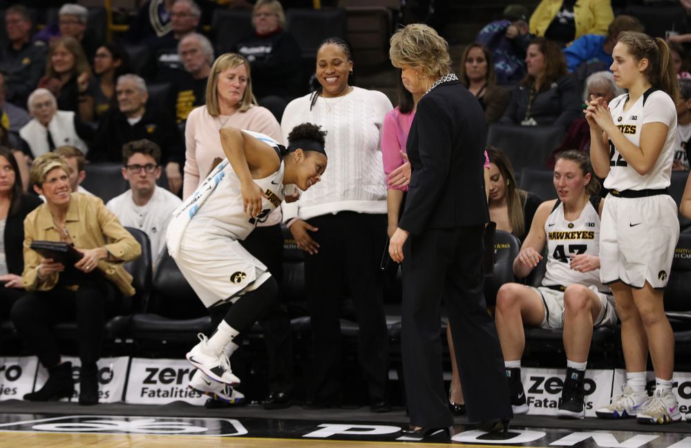Iowa Hawkeyes guard Tania Davis (11) and head coach Lisa Bluder against the Illinois Fighting Illini Thursday, February 14, 2019 at Carver-Hawkeye Arena. (Brian Ray/hawkeyesports.com)