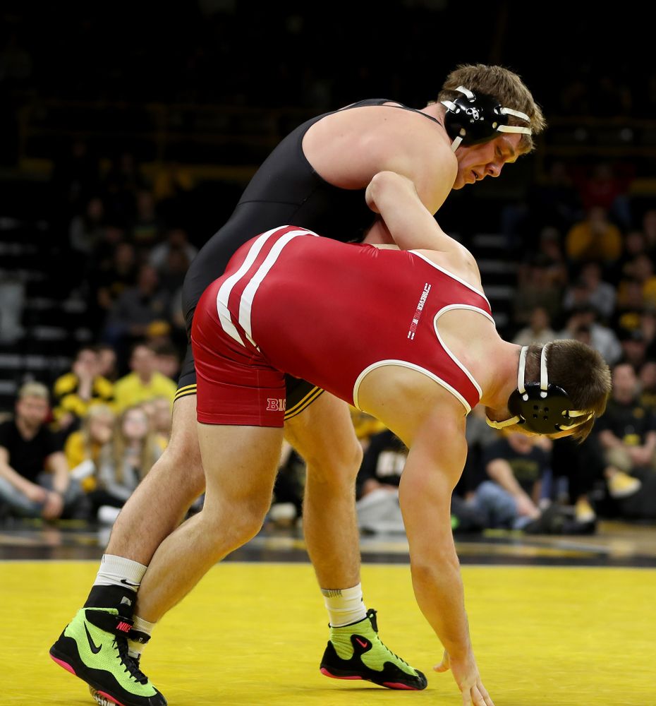 IowaÕs Jacob Warner wrestles WisconsinÕs Taylor Watkins at 197 pounds Sunday, December 1, 2019 at Carver-Hawkeye Arena. Warner won the match 5-2. (Brian Ray/hawkeyesports.com)
