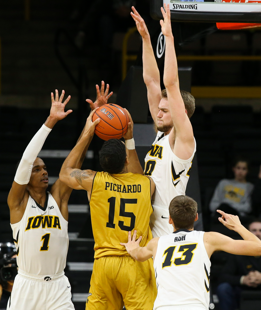 Iowa Hawkeyes guard Maishe Dailey (1) and Iowa Hawkeyes forward Riley Till (20) contest a shot during a game against Alabama State at Carver-Hawkeye Arena on November 21, 2018. (Tork Mason/hawkeyesports.com)