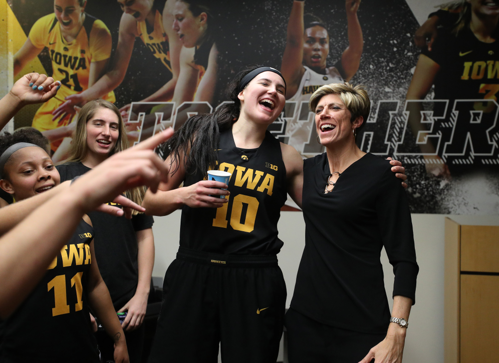 Iowa Hawkeyes forward Megan Gustafson (10) and associate head coach Jan Jensen against the Iowa State Cyclones in the Iowa Corn Cy-Hawk Series Wednesday, December 5, 2018 at Carver-Hawkeye Arena. (Brian Ray/hawkeyesports.com)