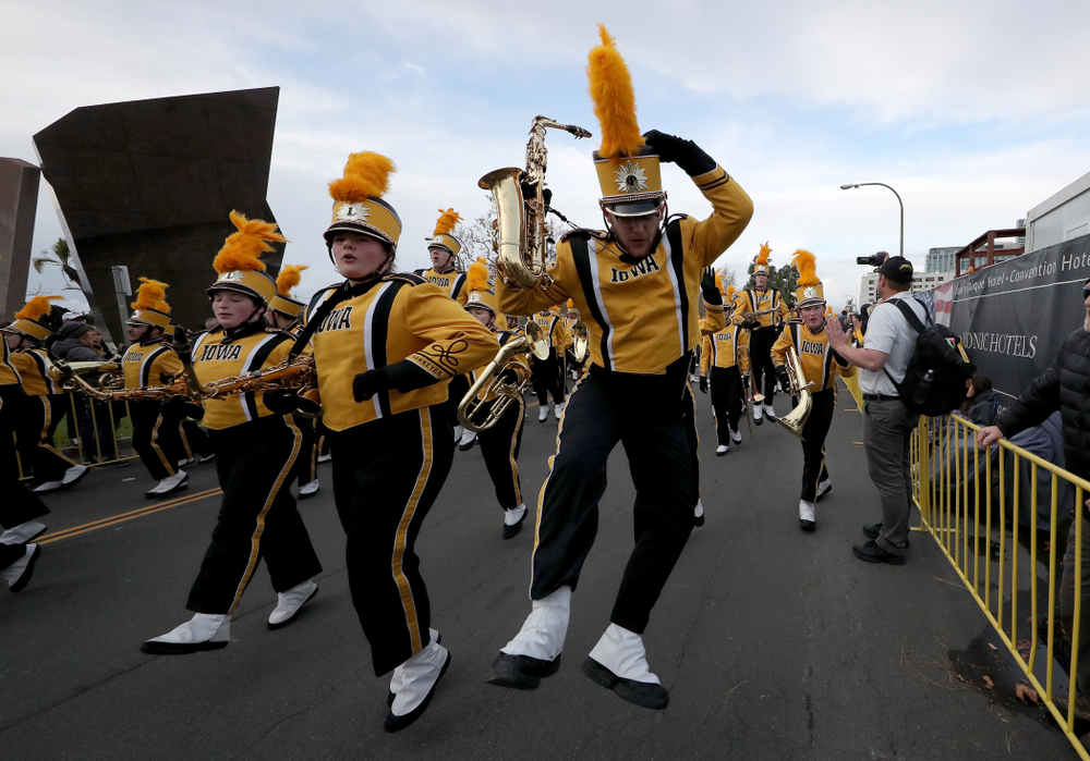 The Hawkeye Marching Band and the Iowa Spirit Squad march in the Holiday Bowl Parade Thursday, December 26, 2019 in San Diego. (Brian Ray/hawkeyesports.com)
