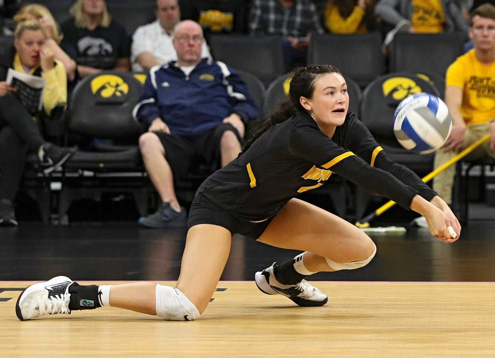 Iowa’s Halle Johnston (4) gets a dig during the third set of their volleyball match at Carver-Hawkeye Arena in Iowa City on Sunday, Oct 13, 2019. (Stephen Mally/hawkeyesports.com)