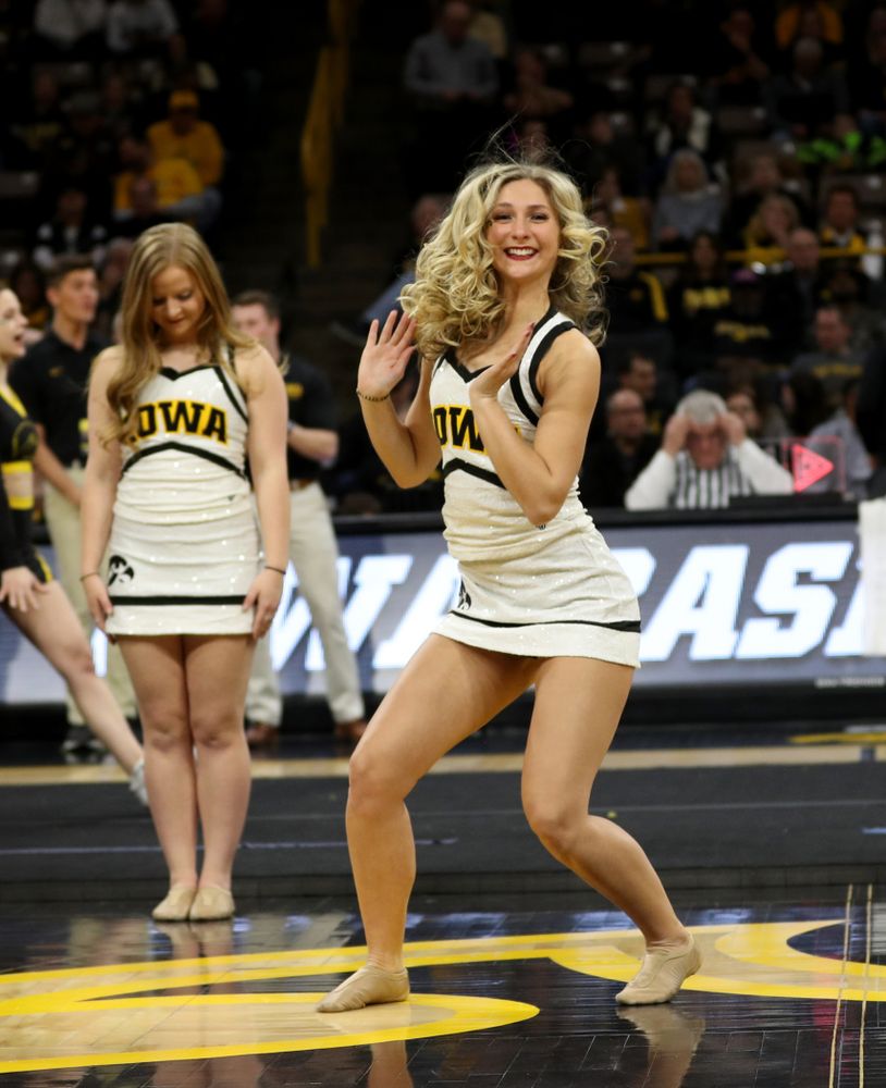 The Iowa Cheerleaders and Dance Team perform on senior night at half-time of the Iowa Hawkeyes game against the Purdue Boilermakers Tuesday, March 3, 2020 at Carver-Hawkeye Arena. (Brian Ray/hawkeyesports.com)