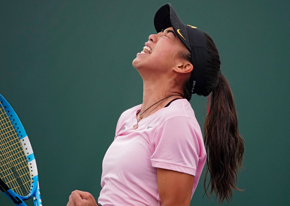 Iowa's Michelle Bacalla celebrates after winning her match against Purdue at the Hawkeye Tennis and Recreation Complex in Iowa City on Friday, Mar. 29, 2019. (Stephen Mally/hawkeyesports.com)