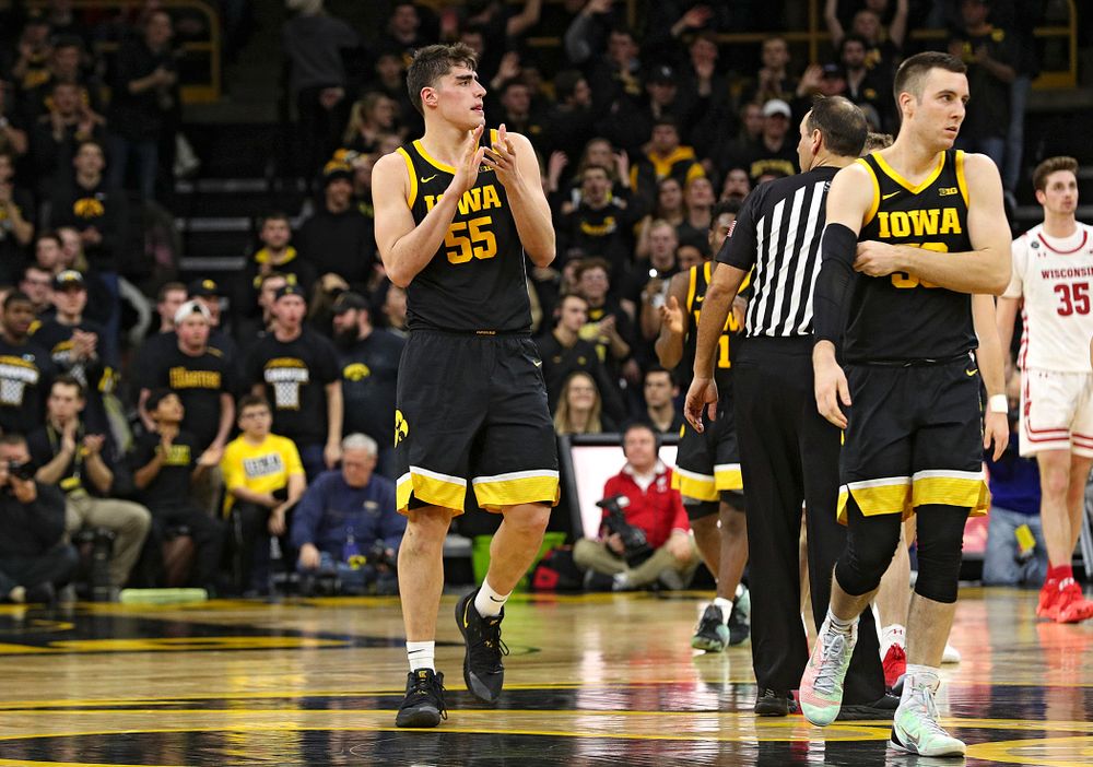 Iowa Hawkeyes center Luka Garza (55) claps during the second half of their game at Carver-Hawkeye Arena in Iowa City on Monday, January 27, 2020. (Stephen Mally/hawkeyesports.com)