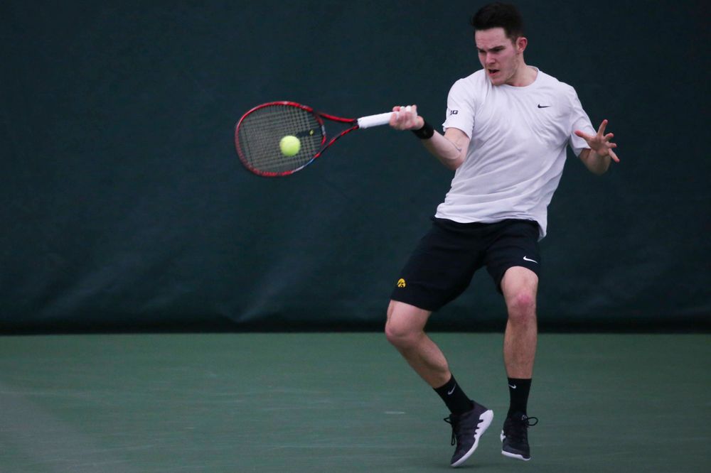 Iowa's Jonas Larsen at a tennis match vs Drake Friday, March 8, 2019 at the Hawkeye Tennis and Recreation Complex. (Lily Smith/hawkeyesports.com)