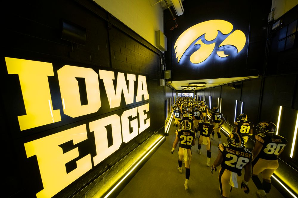 The Iowa Hawkeyes take the field in their new home tunnel before their game against the Miami RedHawks Saturday, August 31, 2019 at Kinnick Stadium in Iowa City. (Brian Ray/hawkeyesports.com)