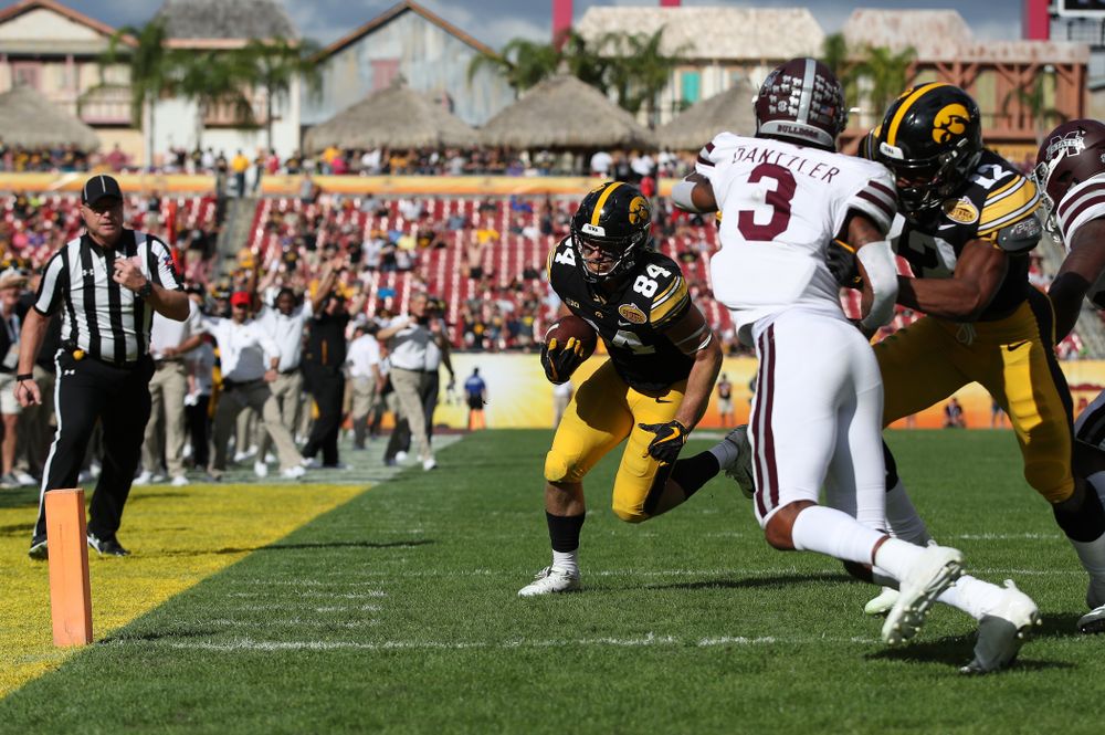 Iowa Hawkeyes wide receiver Nick Easley (84) scores during the Outback Bowl Tuesday, January 1, 2019 at Raymond James Stadium in Tampa, FL. (Brian Ray/hawkeyesports.com)