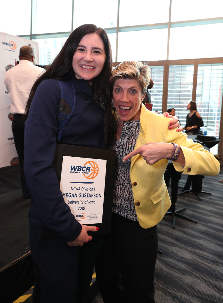 Iowa Hawkeyes forward Megan Gustafson (10) and associate head coach Jan Jensen Wednesday, April 4, 2018 at Amalie Arena in Tampa, FL. (Brian Ray/hawkeyesports.com)
