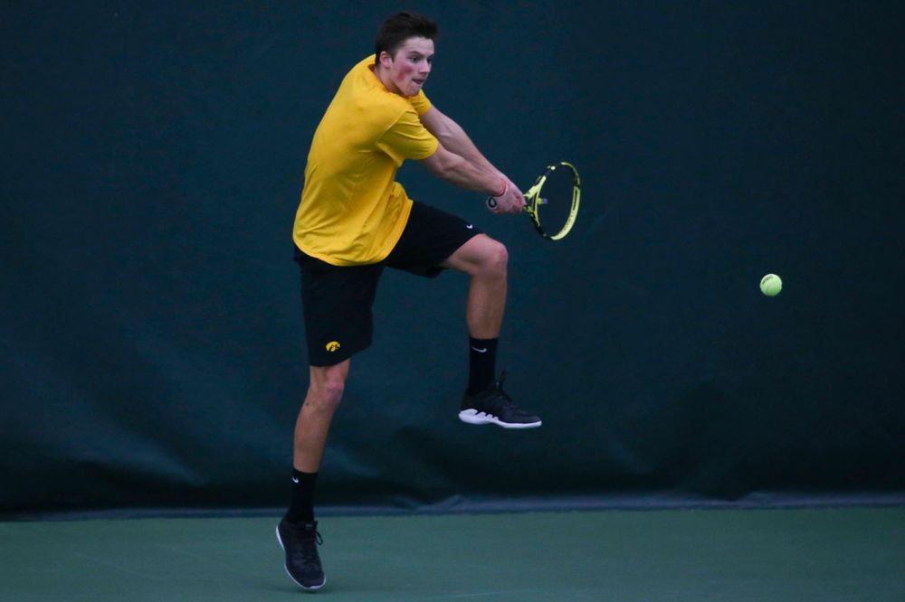 Iowa's Piotr Smietana at a tennis match vs Drake Friday, March 8, 2019 at the Hawkeye Tennis and Recreation Complex. (Lily Smith/hawkeyesports.com)
