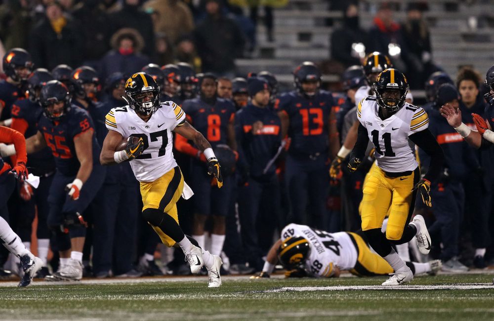 Iowa Hawkeyes defensive back Amani Hooker (27) intercepts a pass against the Illinois Fighting Illini Saturday, November 17, 2018 at Memorial Stadium in Champaign, Ill. (Brian Ray/hawkeyesports.com)
