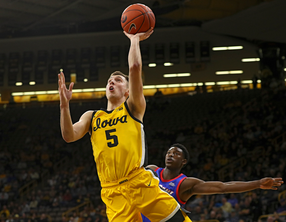 Iowa Hawkeyes guard CJ Fredrick (5) makes a basket during the first half of their game at Carver-Hawkeye Arena in Iowa City on Monday, Nov 11, 2019. (Stephen Mally/hawkeyesports.com)