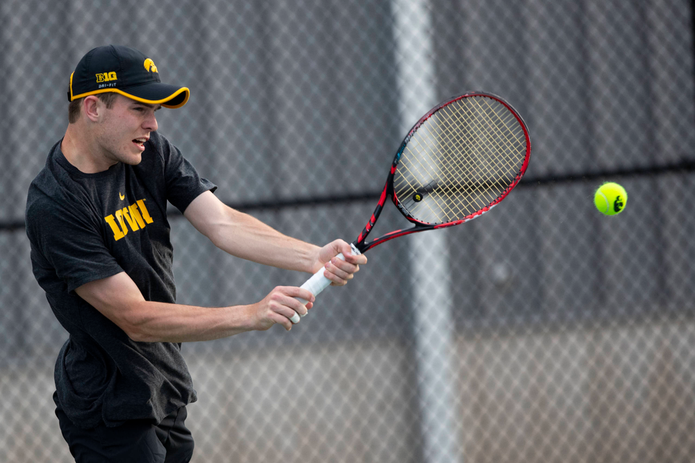 IowaÕs Jonas Larsen at tennis vs Illinois State on Sunday, April 21, 2019 at the Hawkeye Tennis and Recreation Complex. (Lily Smith/hawkeyesports.com)