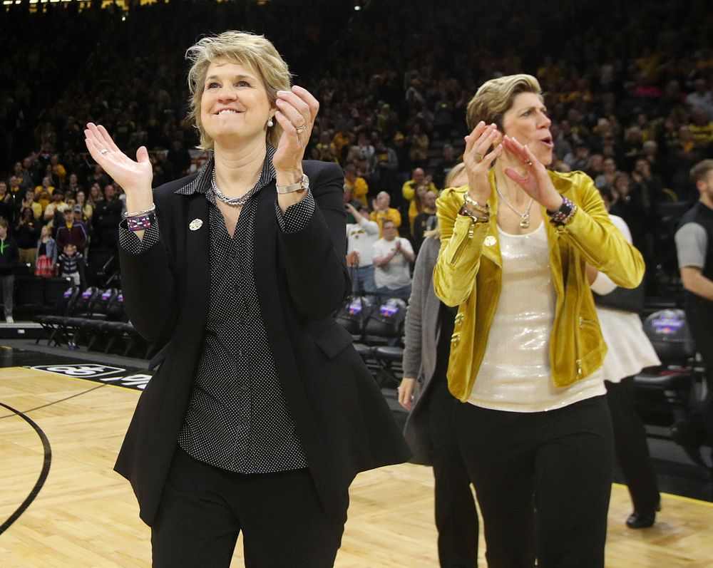 Iowa Hawkeyes head coach Lisa Bluder and associate head coach Jan Jensen clap after winning their second round game in the 2019 NCAA Women's Basketball Tournament at Carver Hawkeye Arena in Iowa City on Sunday, Mar. 24, 2019. (Stephen Mally for hawkeyesports.com)