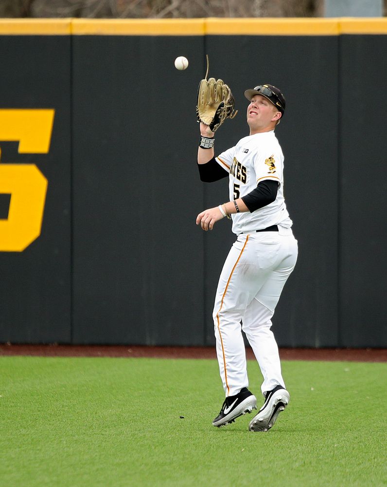 Iowa right fielder Zeb Adreon (5) runs down a fly ball for an out during the third inning of their college baseball game at Duane Banks Field in Iowa City on Wednesday, March 11, 2020. (Stephen Mally/hawkeyesports.com)