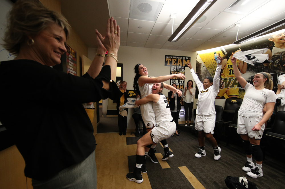 Iowa Hawkeyes forward Megan Gustafson (10) and forward Hannah Stewart (21) celebrate their victory over the Rutgers Scarlet Knights Wednesday, January 23, 2019 at Carver-Hawkeye Arena. (Brian Ray/hawkeyesports.com)
