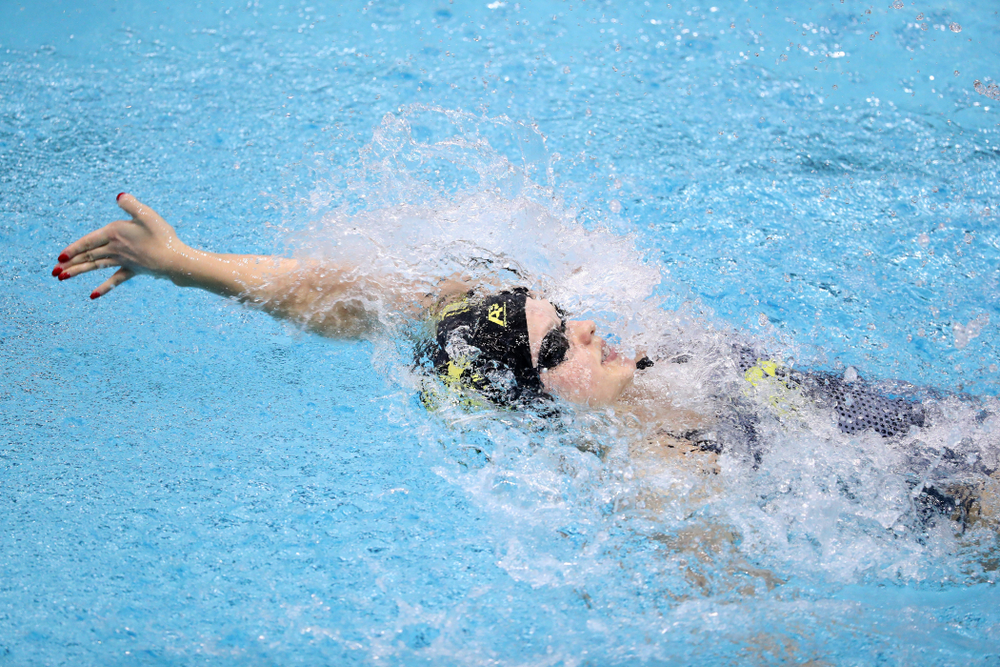 IowaÕs Julia Koluch swims the backstroke leg of the 200 Medley Relay against Notre Dame and Illinois Saturday, January 11, 2020 at the Campus Recreation and Wellness Center. (Brian Ray/hawkeyesports.com)