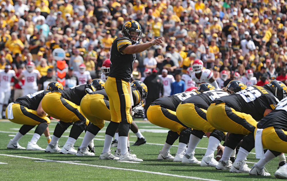 Iowa Hawkeyes quarterback Nate Stanley (4) points at the line during the third quarter of their Big Ten Conference football game at Kinnick Stadium in Iowa City on Saturday, Sep 7, 2019. (Stephen Mally/hawkeyesports.com)