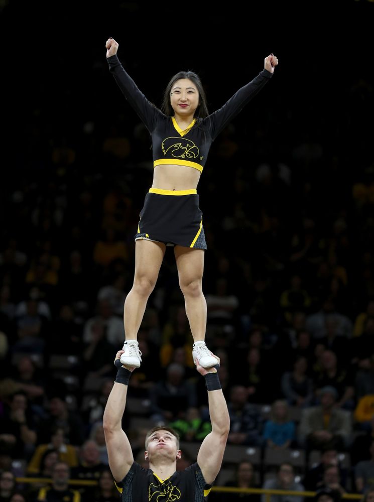 The Iowa Cheerleaders and Dance Team perform on senior night at half-time of the Iowa Hawkeyes game against the Purdue Boilermakers Tuesday, March 3, 2020 at Carver-Hawkeye Arena. (Brian Ray/hawkeyesports.com)