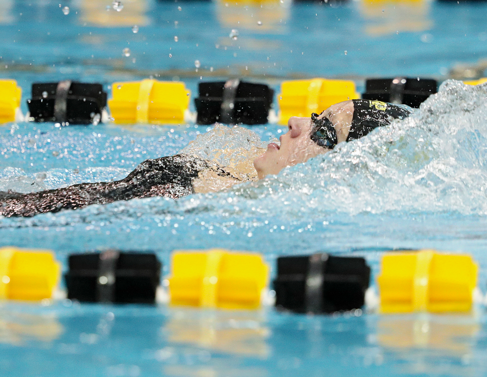 Iowa’s Macy Rink swims the backstroke section of the 100-yard individual medley event during their meet against Michigan State at the Campus Recreation and Wellness Center in Iowa City on Thursday, Oct 3, 2019. (Stephen Mally/hawkeyesports.com)