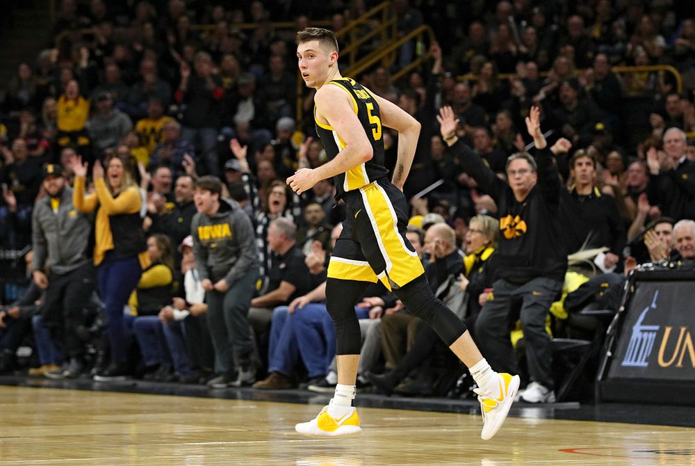 Iowa Hawkeyes guard CJ Fredrick (5) runs down the court after making a 3-pointer during the first half of their game at Carver-Hawkeye Arena in Iowa City on Monday, January 27, 2020. (Stephen Mally/hawkeyesports.com)