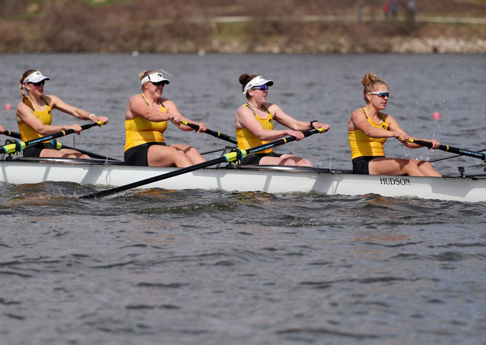 Iowa's Hunter Koenigsfeld (from left), Contessa Harold, Katie Pearson, and Eve Stewart during their 1 Varsity 8 race against Wisconsin in their Big Ten Double Dual Rowing Regatta at Lake Macbride in Solon on Saturday, Apr. 13, 2019. (Stephen Mally/hawkeyesports.com)