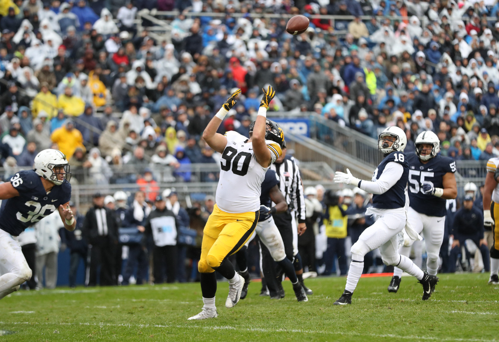 Iowa Hawkeyes defensive end Sam Brincks (90) catches a touchdown pass against the Penn State Nittany Lions Saturday, October 27, 2018 at Beaver Stadium in University Park, Pa. (Max Allen/hawkeyesports.com)