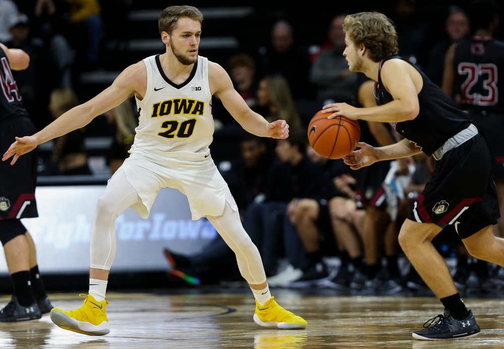 Iowa Hawkeyes forward Riley Till (20) defends during a game against Guilford College at Carver-Hawkeye Arena on November 4, 2018. (Tork Mason/hawkeyesports.com)