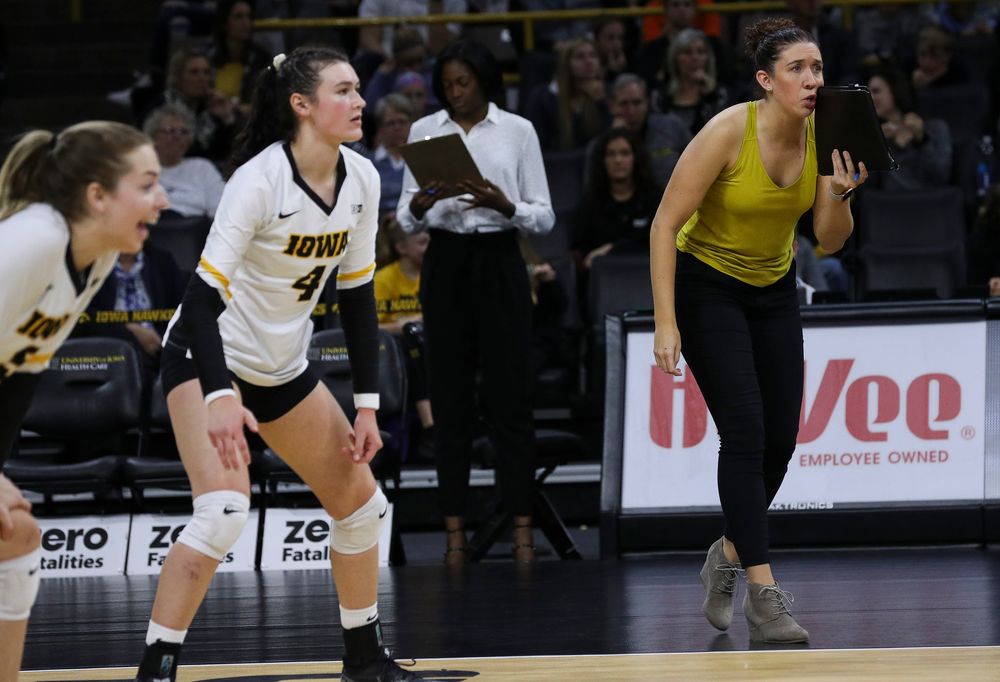 Iowa Hawkeyes assistant coach Bre Payton gives instructions between points during a match against Penn State at Carver-Hawkeye Arena on November 3, 2018. (Tork Mason/hawkeyesports.com)