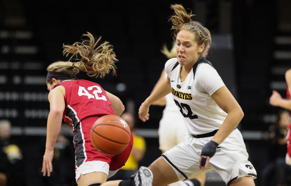 Iowa Hawkeyes guard Kathleen Doyle (22) steals the ball against the IUPUI Jaguars Saturday, December 8, 2018 at Carver-Hawkeye Arena. (Brian Ray/hawkeyesports.com)
