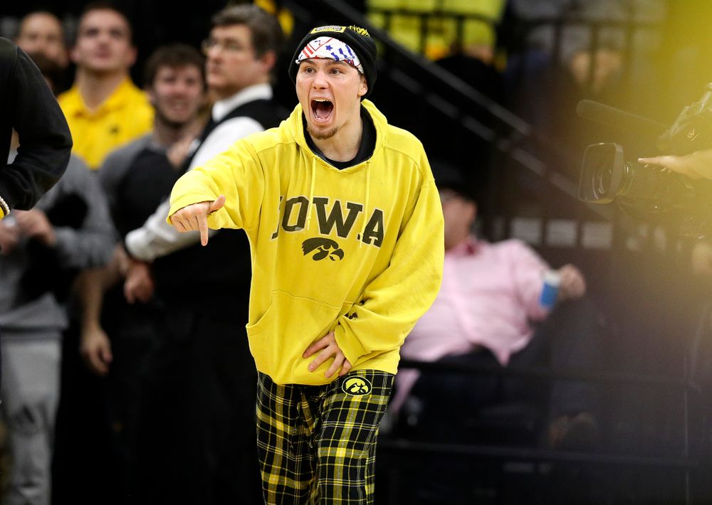 Iowa’s Spencer Lee cheers on Michael Kemerer in his 174-pound match during their dual at Carver-Hawkeye Arena in Iowa City on Friday, January 31, 2020. (Stephen Mally/hawkeyesports.com)