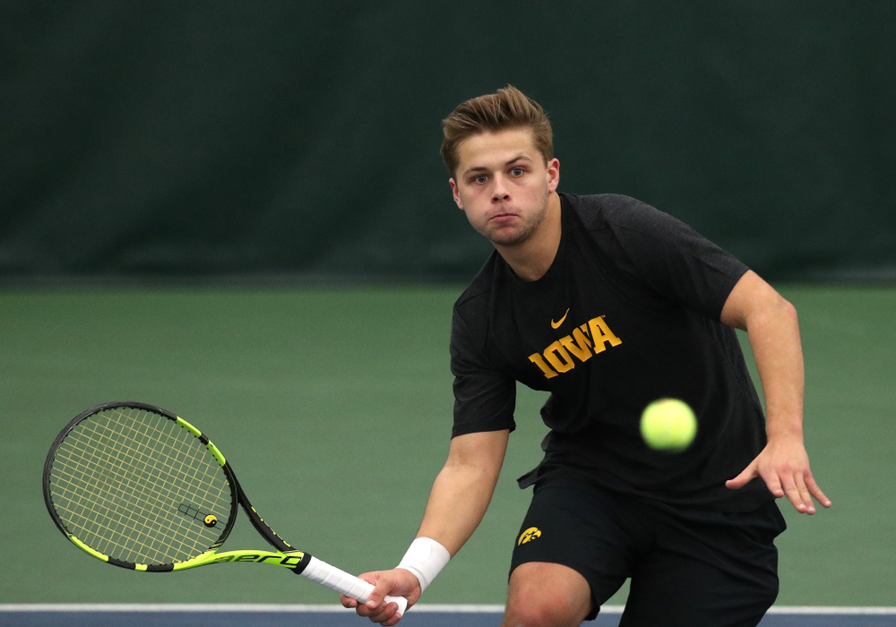 Will Davies and Oliver Okonkwo plays a doubles match against the Miami Hurricanes Friday, February 8, 2019 at the Hawkeye Tennis and Recreation Complex. (Brian Ray/hawkeyesports.com)