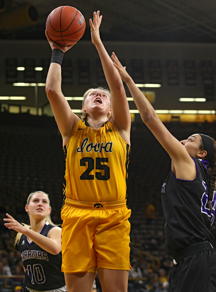 Iowa forward/center Monika Czinano (25) makes a basket during the fourth quarter of their game against Winona State at Carver-Hawkeye Arena in Iowa City on Sunday, Nov 3, 2019. (Stephen Mally/hawkeyesports.com)