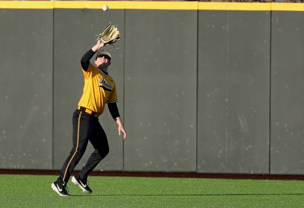 Iowa Hawkeyes right fielder Zeb Adreon (5) pulls in a fly ball for an out during the eighth inning of their game at Duane Banks Field in Iowa City on Tuesday, Apr. 2, 2019. (Stephen Mally/hawkeyesports.com)
