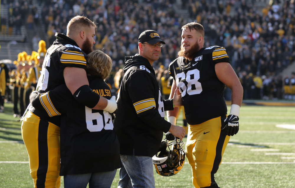 Iowa Hawkeyes offensive lineman Landan Paulsen (68) and offensive lineman Levi Paulsen (66) during Senior Day festivities before their game against the Illinois Fighting Illini Saturday, November 23, 2019 at Kinnick Stadium. (Brian Ray/hawkeyesports.com)