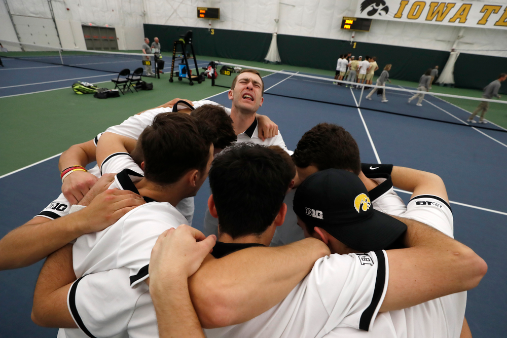 Iowa's Jake Jacoby pumps up his teammates before their match against Purdue Sunday, April 15, 2018 at the Hawkeye Tennis and Recreation Center. (Brian Ray/hawkeyesports.com)