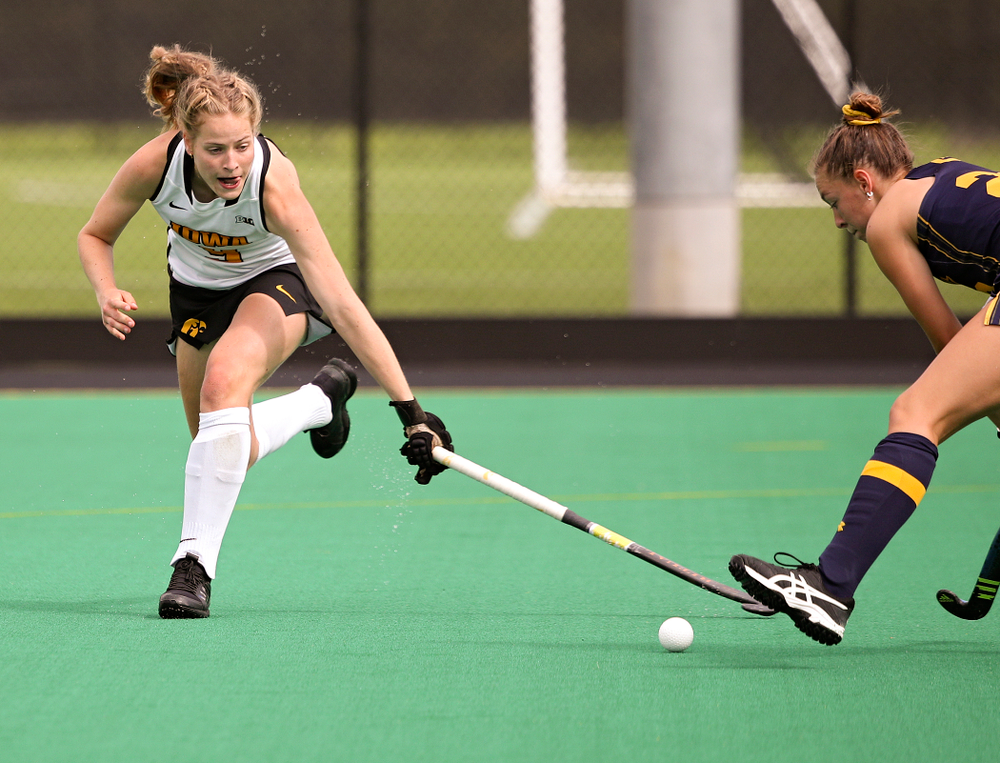 Iowa’s Sofie Stribos (9) reaches for the ball during the first quarter of their game at Grant Field in Iowa City on Friday, Sep 13, 2019. (Stephen Mally/hawkeyesports.com)