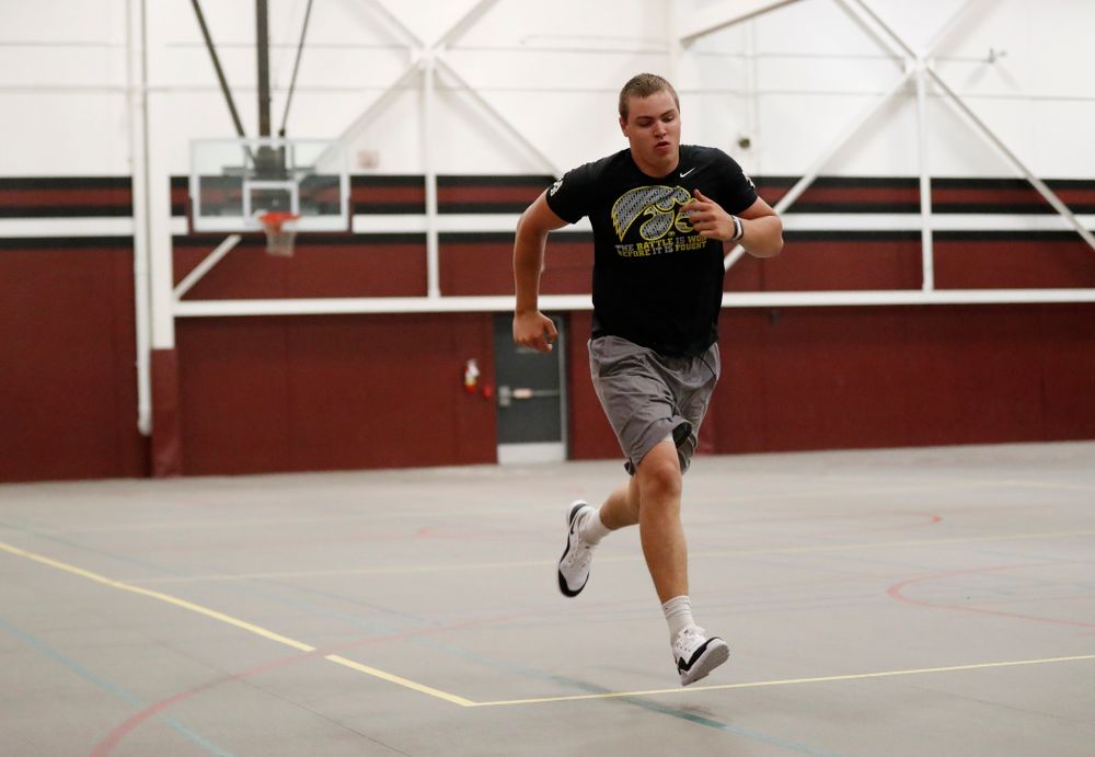 Iowa Hawkeyes quarterback Nathan Stanley (4) works out at his high school Wednesday, May 30, 2018 in Menomonie, Wisc. (Brian Ray/hawkeyesports.com)