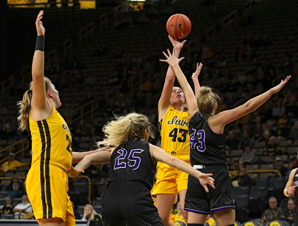 Iowa forward Amanda Ollinger (43) puts up a shot during the second quarter of their game against Winona State at Carver-Hawkeye Arena in Iowa City on Sunday, Nov 3, 2019. (Stephen Mally/hawkeyesports.com)