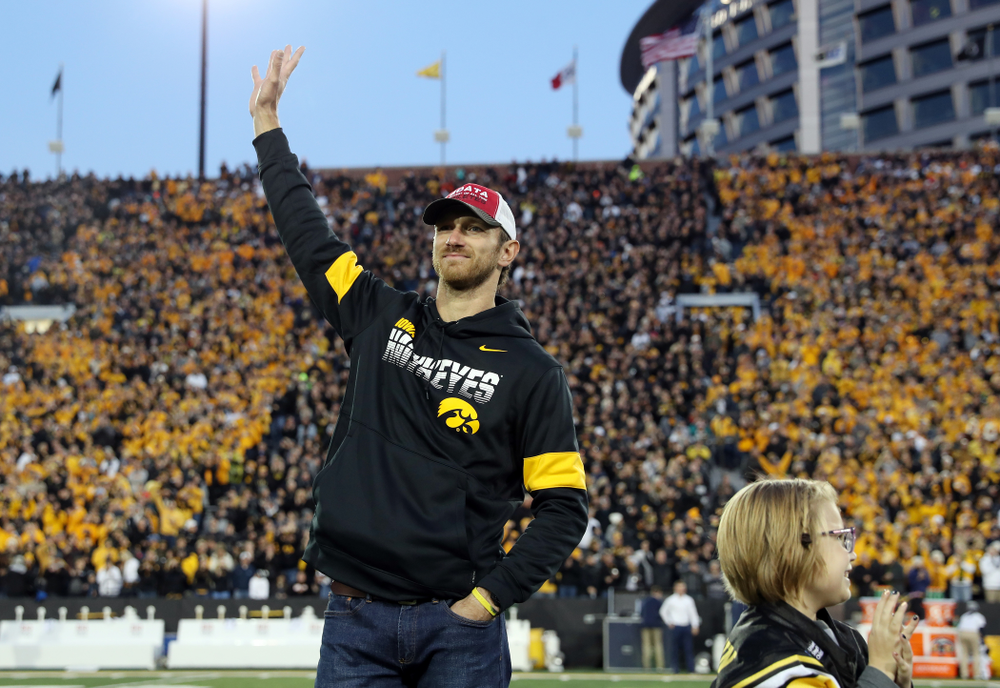 Honorary Captain Ricky Stanzi and Stead Family ChildrenÕs Hospital Kid Captain Gabby Yoder before the Iowa Hawkeyes game against the Penn State Nittany Lions Saturday, October 12, 2019 at Kinnick Stadium. (Brian Ray/hawkeyesports.com)