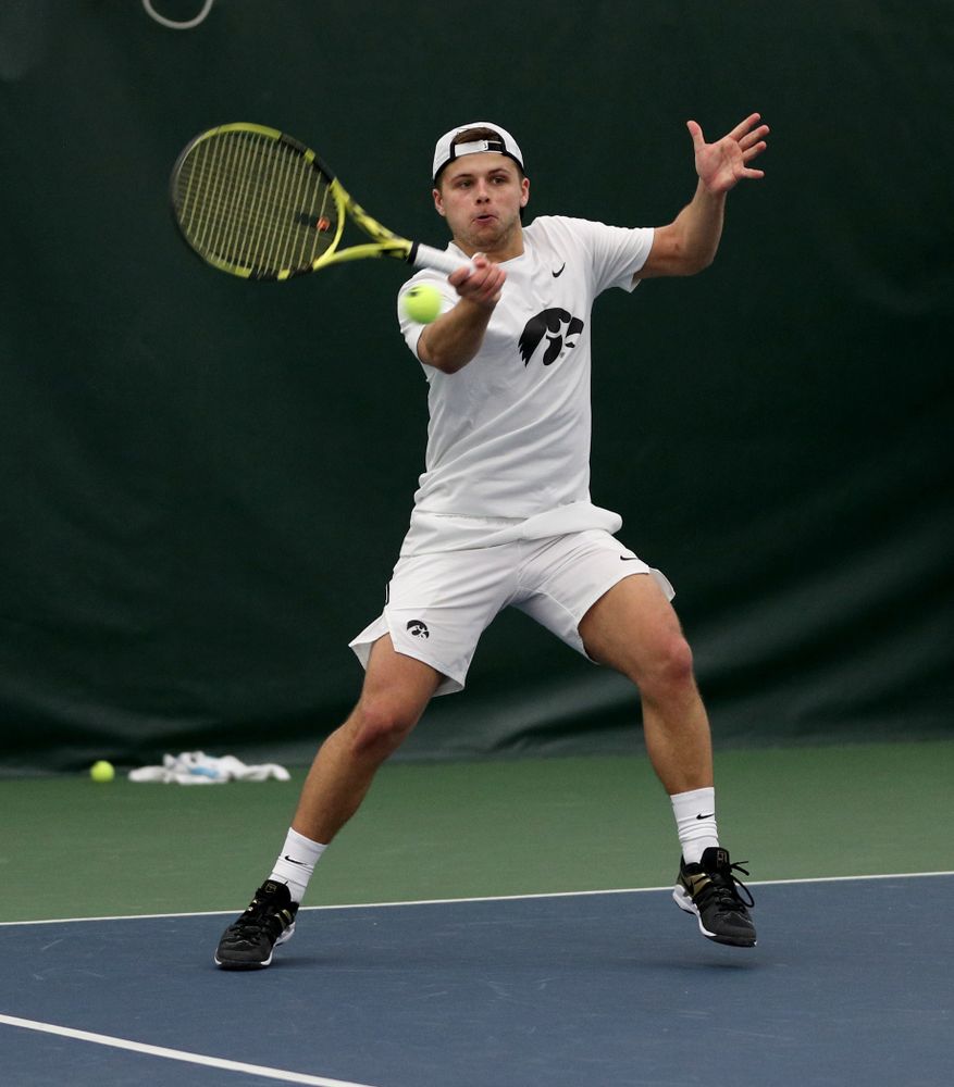 Iowa’s Will Davies against Cornell Sunday, March 8, 2020 at the Hawkeye Tennis and Recreation Center. (Brian Ray/hawkeyesports.com)