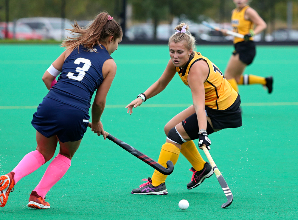 Iowa’s Leah Zellner (13) tries to poke the ball away during the first quarter of their game against UC Davis at Grant Field in Iowa City on Sunday, Oct 6, 2019. (Stephen Mally/hawkeyesports.com)