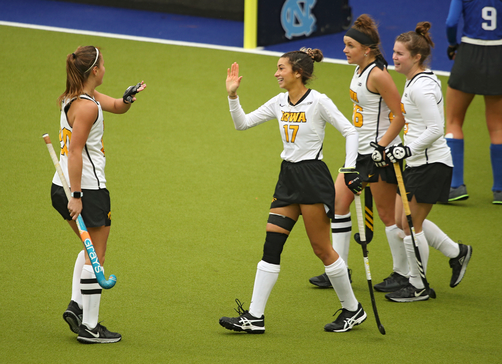 Iowa’s Sophie Sunderland (20) high-fives Ciara Smith (17) during the third quarter of their NCAA Tournament First Round match against Duke at Karen Shelton Stadium in Chapel Hill, N.C. on Friday, Nov 15, 2019. (Stephen Mally/hawkeyesports.com)