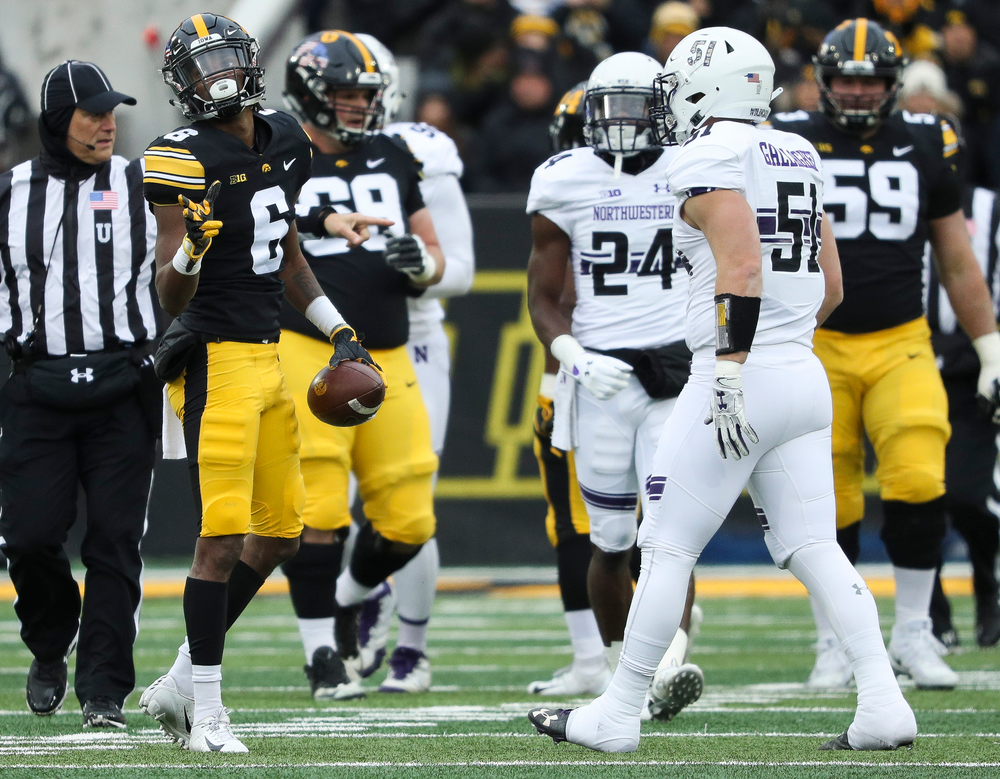 Iowa Hawkeyes wide receiver Ihmir Smith-Marsette (6) signals for a first down after making a reception during a game against Northwestern at Kinnick Stadium on November 10, 2018. (Tork Mason/hawkeyesports.com)