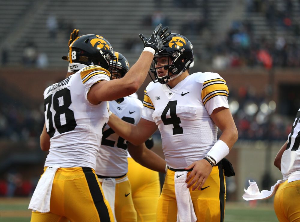 Iowa Hawkeyes tight end T.J. Hockenson (38) and quarterback Nate Stanley (4) against the Illinois Fighting Illini Saturday, November 17, 2018 at Memorial Stadium in Champaign, Ill. (Brian Ray/hawkeyesports.com)