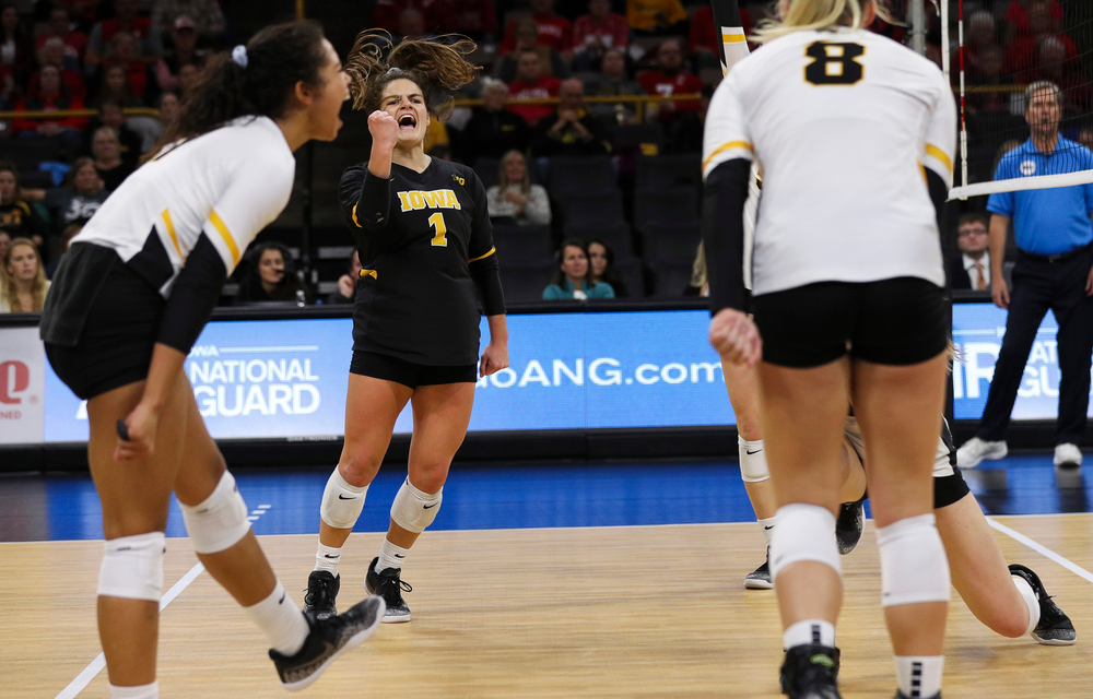 Iowa Hawkeyes defensive specialist Molly Kelly (1) celebrates after winning a point during a match against Nebraska at Carver-Hawkeye Arena on November 7, 2018. (Tork Mason/hawkeyesports.com)