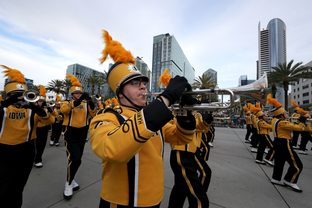 The Hawkeye Marching Band and the Iowa Spirit Squad march in the Holiday Bowl Parade Thursday, December 26, 2019 in San Diego. (Brian Ray/hawkeyesports.com)