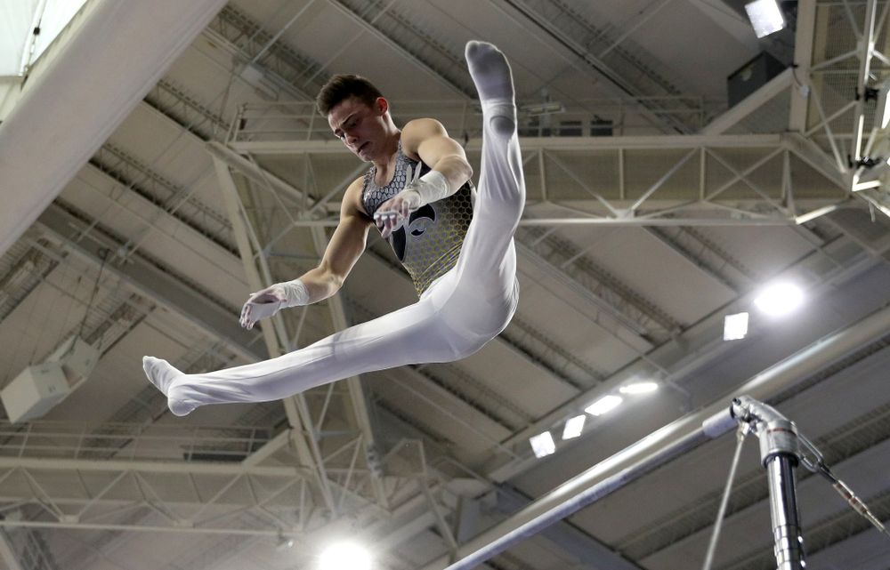 Iowa’s Mitch Mandozzi competes on the high bar against UIC and Minnesota Saturday, February 1, 2020 at Carver-Hawkeye Arena. (Brian Ray/hawkeyesports.com)